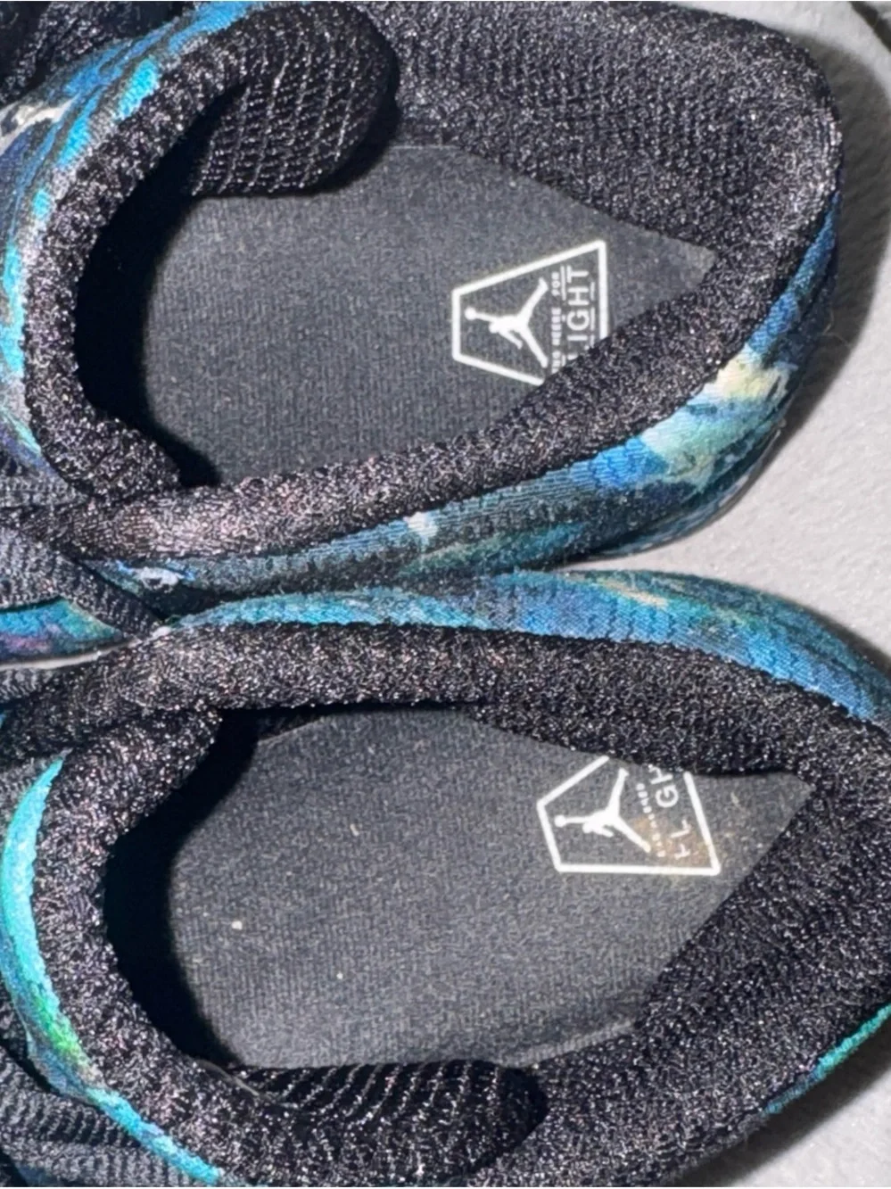 Jordan Men’s High-Top Athletic Shoes in Teal and Black Abstract Print